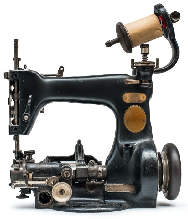 Vintage sewing machine white isolated